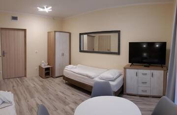 Фото номера Трехместный номер Апарт-отели Hotel Lazur Apartamenty г. Свиноуйсьце 14