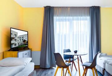 Фото номера Трехместный номер Апарт-отели Hotel Lazur Apartamenty г. Свиноуйсьце 4