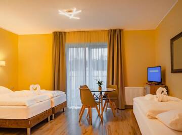 Фото номера Трехместный номер Апарт-отели Hotel Lazur Apartamenty г. Свиноуйсьце 9