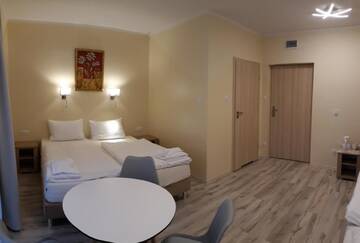 Фото номера Трехместный номер Апарт-отели Hotel Lazur Apartamenty г. Свиноуйсьце 10