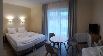 Фото номера Трехместный номер Апарт-отели Hotel Lazur Apartamenty г. Свиноуйсьце 11