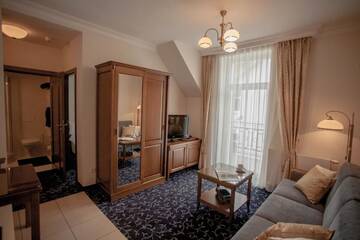 Фото номера One-Bedroom Standard Apartment B with Balcony Апартаменты Apartamenty Villa Artis г. Свиноуйсьце 7