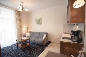 Фото номера One-Bedroom Standard Apartment B with Balcony Апартаменты Apartamenty Villa Artis г. Свиноуйсьце 10