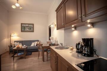 Фото номера One-Bedroom Standard Apartment A with Balcony Апартаменты Apartamenty Villa Artis г. Свиноуйсьце 4