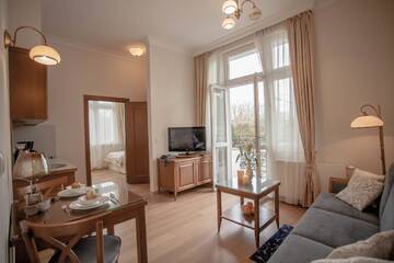 Фото номера One-Bedroom Standard Apartment A with Balcony Апартаменты Apartamenty Villa Artis г. Свиноуйсьце 2