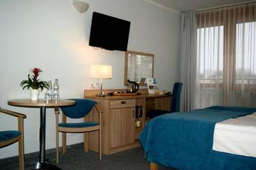 Фото номера Улучшенный трехместный номер Отель Hotel ***NAT Świnoujście г. Свиноуйсьце 4