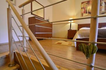 Фото номера Duplex Suite - Uzdrowiskowa 11 Апартаменты Apartamenty na Wyspie - Promenada г. Свиноуйсьце 3
