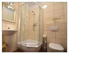 Фото номера Апартаменты с балконом - Uzdrowiskowa 7 Апартаменты Apartamenty na Wyspie - Promenada г. Свиноуйсьце 4