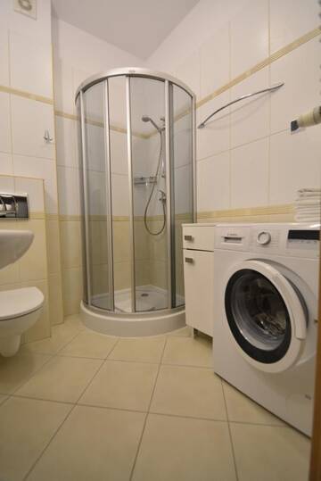 Фото номера Номер-студио с балконом и бесплатной парковкой - Uzdrowiskowa 11 Апартаменты Apartamenty na Wyspie - Promenada г. Свиноуйсьце 2