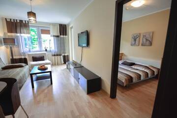 Фото номера Maisonette - 4 Orzeszkowej Street Апартаменты Apartamenty na Wyspie - Feniks г. Свиноуйсьце 54