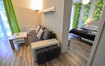 Фото номера One-Bedroom Apartment with Free Parking - 22 Апартаменты Apartamenty na Wyspie - Villa Pegaz г. Свиноуйсьце 10