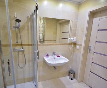Фото номера One-Bedroom Apartment with Free Parking - 22 Апартаменты Apartamenty na Wyspie - Villa Pegaz г. Свиноуйсьце 11