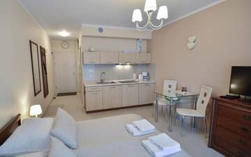 Фото номера Апартаменты, бесплатная парковка - 13 Апартаменты Apartamenty na Wyspie - Villa Pegaz г. Свиноуйсьце 12
