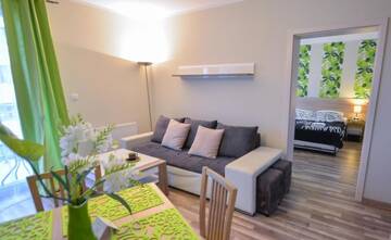 Фото номера One-Bedroom Apartment with Free Parking - 22 Апартаменты Apartamenty na Wyspie - Villa Pegaz г. Свиноуйсьце 5