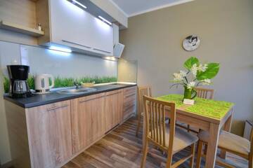 Фото номера One-Bedroom Apartment with Free Parking - 22 Апартаменты Apartamenty na Wyspie - Villa Pegaz г. Свиноуйсьце 6