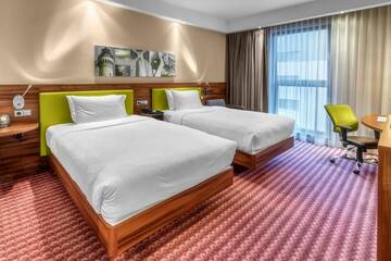 Фото номера Двухместный номер с 2 отдельными кроватями Отель Hampton by Hilton Świnoujscie г. Свиноуйсьце 2