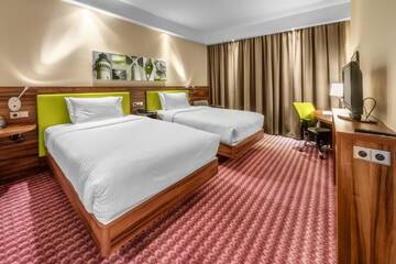 Фото номера Двухместный номер с 2 отдельными кроватями Отель Hampton by Hilton Świnoujscie г. Свиноуйсьце 3