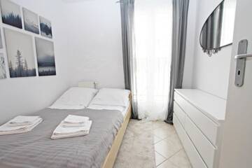 Фото номера Семейный номер с душем Апартаменты Baltic Home Promenada г. Свиноуйсьце 9