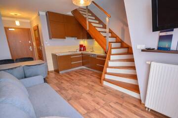 Фото номера Мезонет Апартаменты Apartamenty na Wyspie - Villa Mistral г. Свиноуйсьце 17