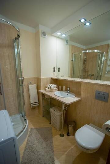 Фото номера Апартаменты с 1 спальней Апартаменты Apartamenty na Wyspie - Villa Mistral г. Свиноуйсьце 17