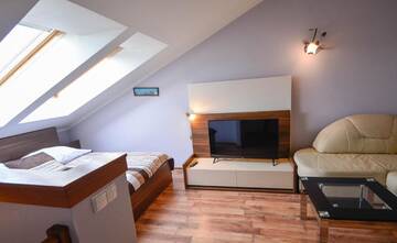 Фото номера Мезонет Апартаменты Apartamenty na Wyspie - Villa Mistral г. Свиноуйсьце 9