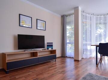 Фото номера Апартаменты с 1 спальней Апартаменты Apartamenty na Wyspie - Villa Mistral г. Свиноуйсьце 3