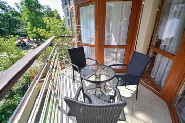 Фото номера Апартаменты с 1 спальней Апартаменты Apartamenty na Wyspie - Villa Mistral г. Свиноуйсьце 2