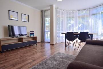Фото номера Апартаменты с 1 спальней Апартаменты Apartamenty na Wyspie - Villa Mistral г. Свиноуйсьце 5