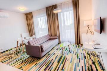 Фото номера Улучшенный люкс с частичным видом на море Апартаменты Baltic Park Molo Apartments by Zdrojowa г. Свиноуйсьце 3