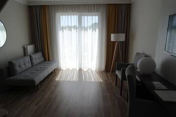 Фото номера Апартаменты - Двухуровневые Отель Hotel Trzy Wyspy г. Свиноуйсьце 4