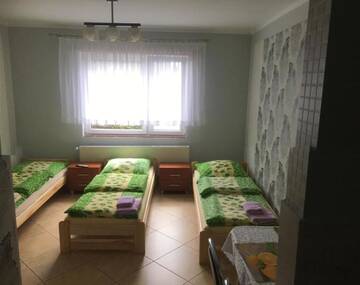 Фото номера Трехместный номер с собственной ванной комнатой Отели типа «постель и завтрак» Pod Kasztanem г. Свиноуйсьце 13