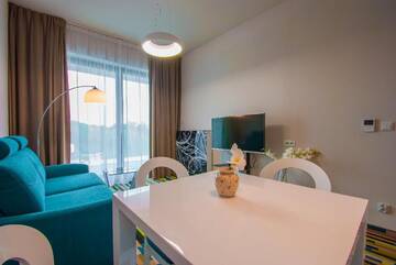 Фото номера Апартаменты с 1 спальней и балконом Апартаменты Apartamenty Na Wyspie - Baltic Molo г. Свиноуйсьце 3