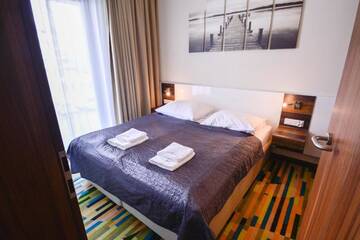 Фото номера Апартаменты с 3 спальнями Апартаменты Apartamenty Na Wyspie - Baltic Molo г. Свиноуйсьце 22