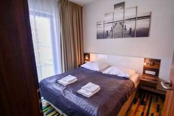 Фото номера Апартаменты с 3 спальнями Апартаменты Apartamenty Na Wyspie - Baltic Molo г. Свиноуйсьце 23