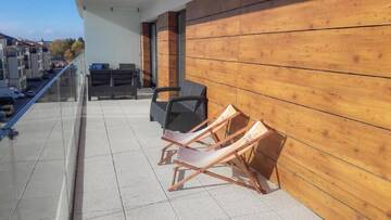 Фото номера Апартаменты с 2 спальнями и видом на море Апартаменты Apartamenty Na Wyspie - Baltic Molo г. Свиноуйсьце 4