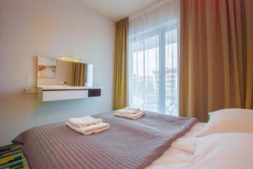 Фото номера Апартаменты с 1 спальней и балконом Апартаменты Apartamenty Na Wyspie - Baltic Molo г. Свиноуйсьце 15