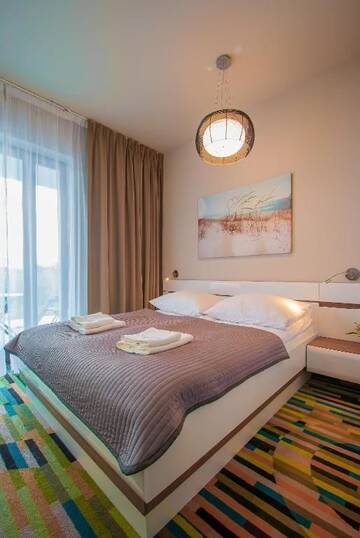 Фото номера Апартаменты с 1 спальней и балконом Апартаменты Apartamenty Na Wyspie - Baltic Molo г. Свиноуйсьце 12