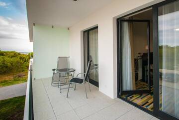 Фото номера Апартаменты с 1 спальней и балконом Апартаменты Apartamenty Na Wyspie - Baltic Molo г. Свиноуйсьце 14
