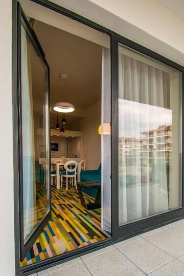 Фото номера Апартаменты с 1 спальней и балконом Апартаменты Apartamenty Na Wyspie - Baltic Molo г. Свиноуйсьце 11