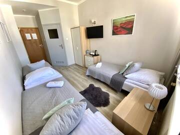 Фото номера Трехместный номер с собственной ванной комнатой Хостелы Stawa Hostel &amp; Apartments г. Свиноуйсьце 4