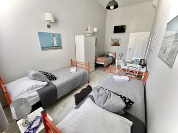 Фото номера Трехместный номер с общей ванной комнатой Хостелы Stawa Hostel &amp; Apartments г. Свиноуйсьце 3