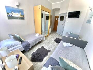 Фото номера Трехместный номер с собственной ванной комнатой Хостелы Stawa Hostel &amp; Apartments г. Свиноуйсьце 2