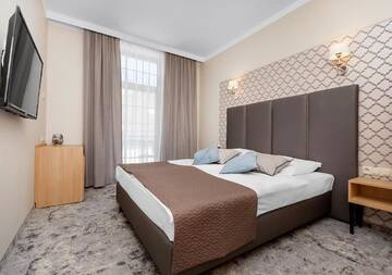 Фото номера Небольшой двухместный номер с 1 кроватью Проживание в семье Villa Grand Solis г. Свиноуйсьце 4