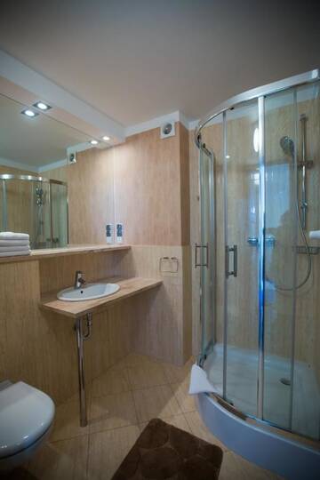 Фото номера Апартаменты с 1 спальней Апартаменты Baltic Home Villa Mistral г. Свиноуйсьце 6