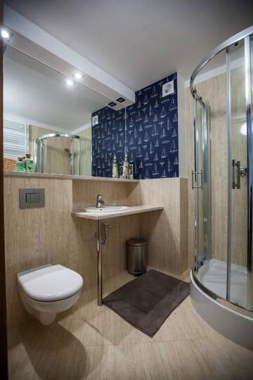 Фото номера Апартаменты с 1 спальней Апартаменты Baltic Home Villa Mistral г. Свиноуйсьце 8