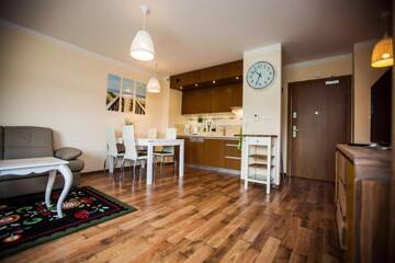 Фото номера Апартаменты с 1 спальней Апартаменты Baltic Home Villa Mistral г. Свиноуйсьце 5