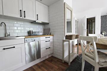 Фото номера Двухуровневые апартаменты Апартаменты Baltic Home Villa Mistral г. Свиноуйсьце 11