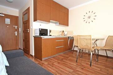 Фото номера Апартаменты с балконом Апартаменты Baltic Home Villa Mistral г. Свиноуйсьце 3