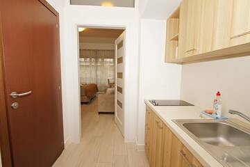 Фото номера Апартаменты - 1-й этаж Апартаменты Baltic Home Aquamarina г. Свиноуйсьце 9