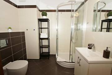 Фото номера Апартаменты - 1-й этаж Апартаменты Baltic Home Aquamarina г. Свиноуйсьце 10